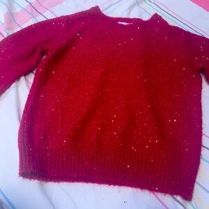 Selling a cute red shirt that’s comfy for eight year old no rips or tears